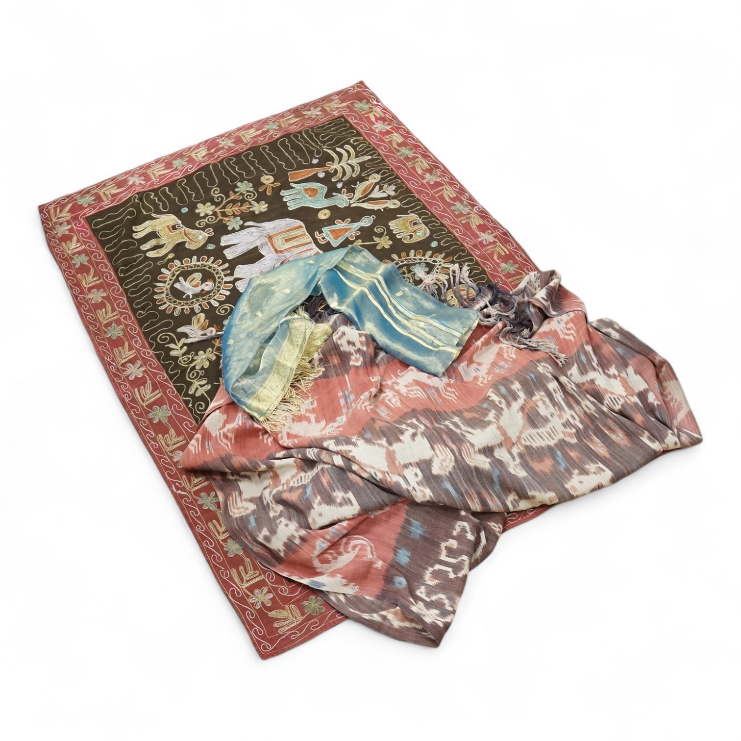 A Sumbanese shoulder cloth, an Indian chain stitch panel and a finely woven silk stole